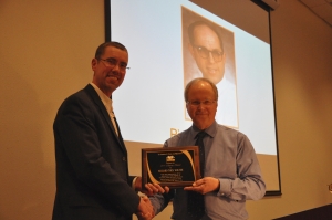 Jim Miller accepting award on behalf of Richard Kolter